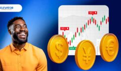 A man who is happy and starting at different forex currencies